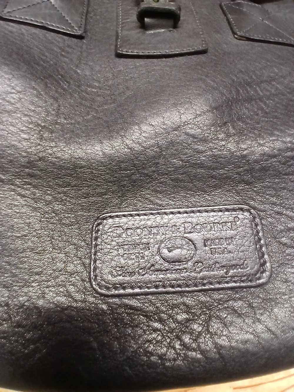 Dooney & Bourke Black Leather Tote with Gold Charm